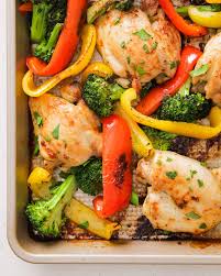 baked chicken breast with roast vegetables carrots, broccoli, red peppers, garlic,  parsley, easy dinners 