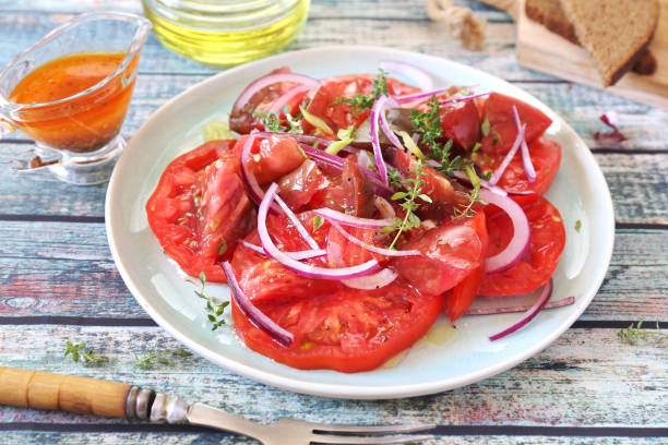 Elevate every bite with this Tomato and Onion Salad!
