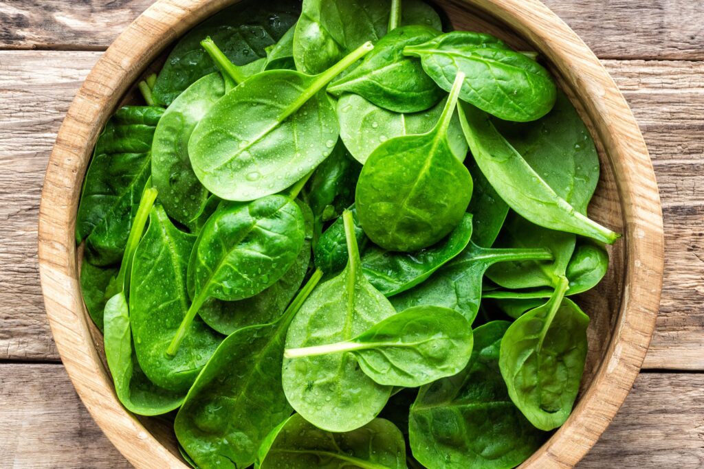 spinach leaves in a bowl on a table, easy dinner, healthy meals, 