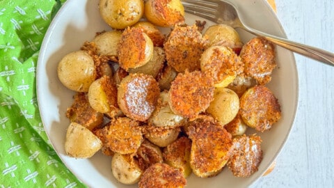 delicious parmesan potatoes in a bowl 