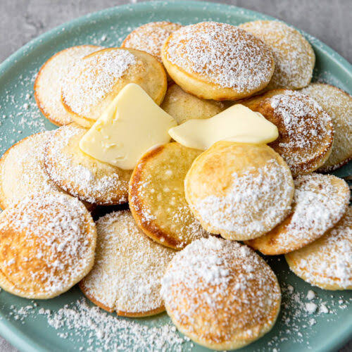 Classic Dutch poffertjes with butter and sugar