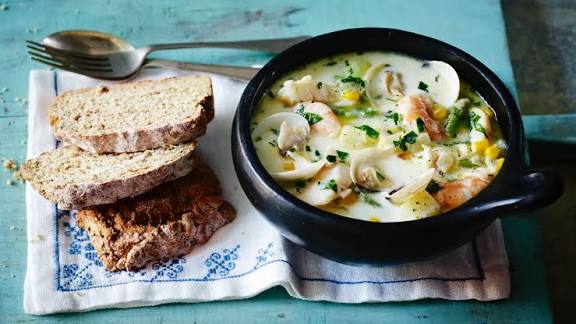 Homemade seafood chowder with soda bread 
