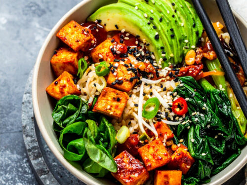 Freshly made vegan tiktok ramen with tofu, bok choy, spinach, avocado and sesame seed