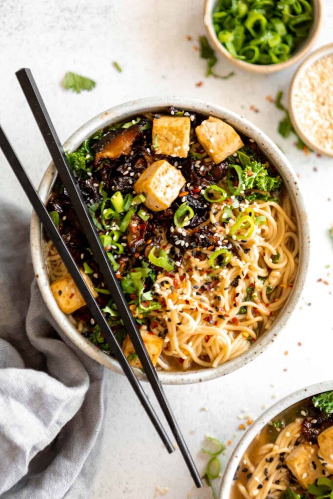 Delicious Vegan Tiktok Ramen Recipe with Tofu and sesame seeds served in a white bowl.