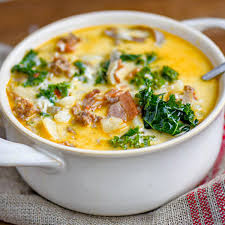 Homemade zuppa toscana soup with kale in a white bowl